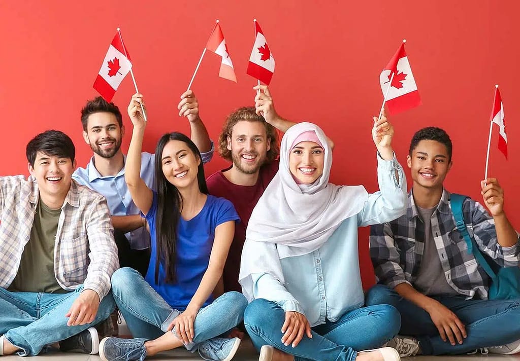 3 men and 3 ladies each carrying the Canada flag with so much brimming smile and exciting. 