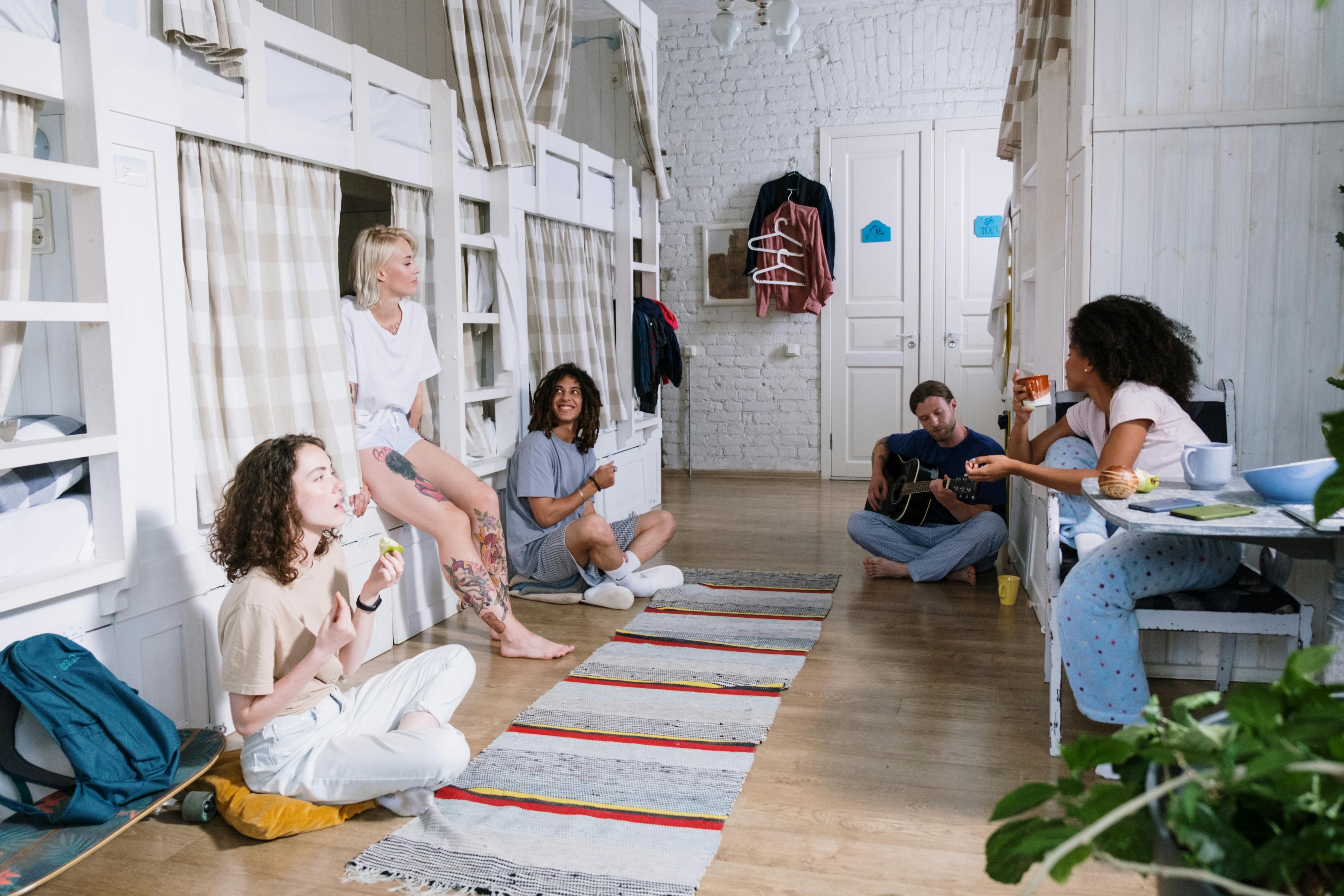 Free Group of Friend Inside a Dormitory Stock Photo